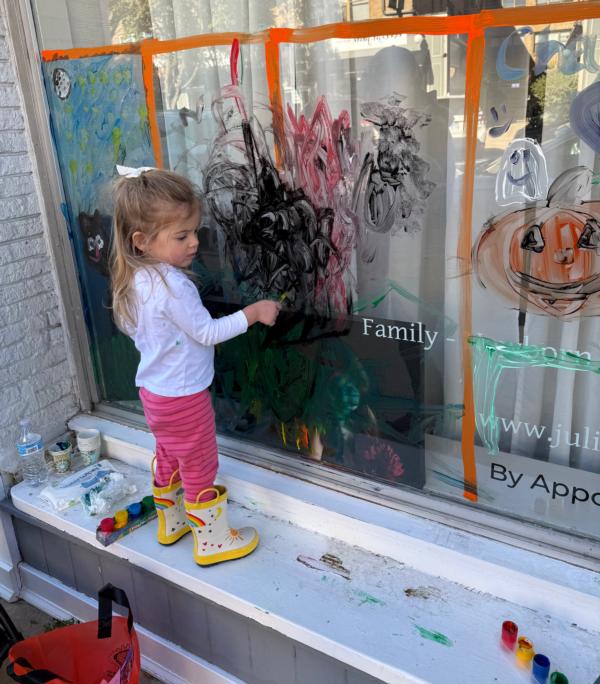 Main article image for story titled 'Done In A Day: Halloween Window Painting 2024!'