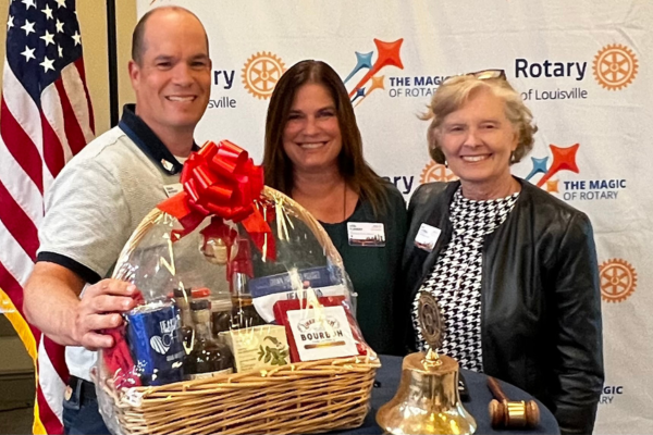 Craig Mooney wins Polio Plus gift basket drawing